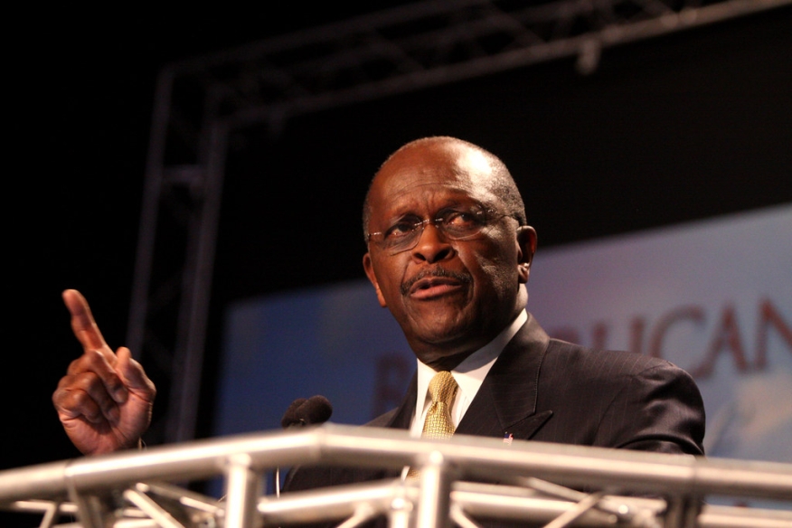 Herman Cain has refuted press reports that he was planning to withdraw from consideration for a position on the Federal Reserve Board