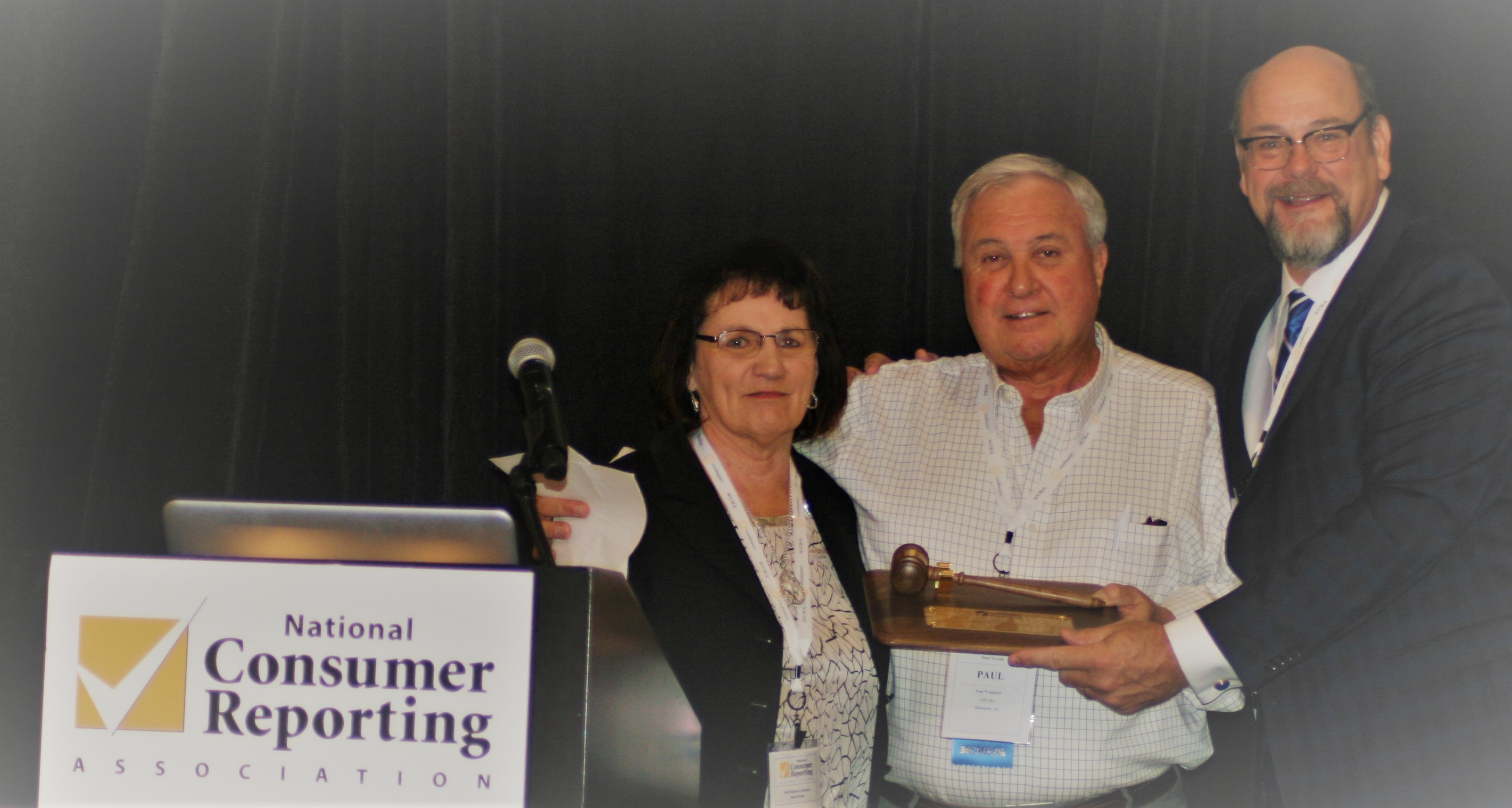NCRA changed leadership at its Annual Conference as Executive Director Terry Clemans (right) passes the gavel of leadership from NCRA 2018 President Paul Wohkittel (center) to 2019 President Mary Campbell (left)