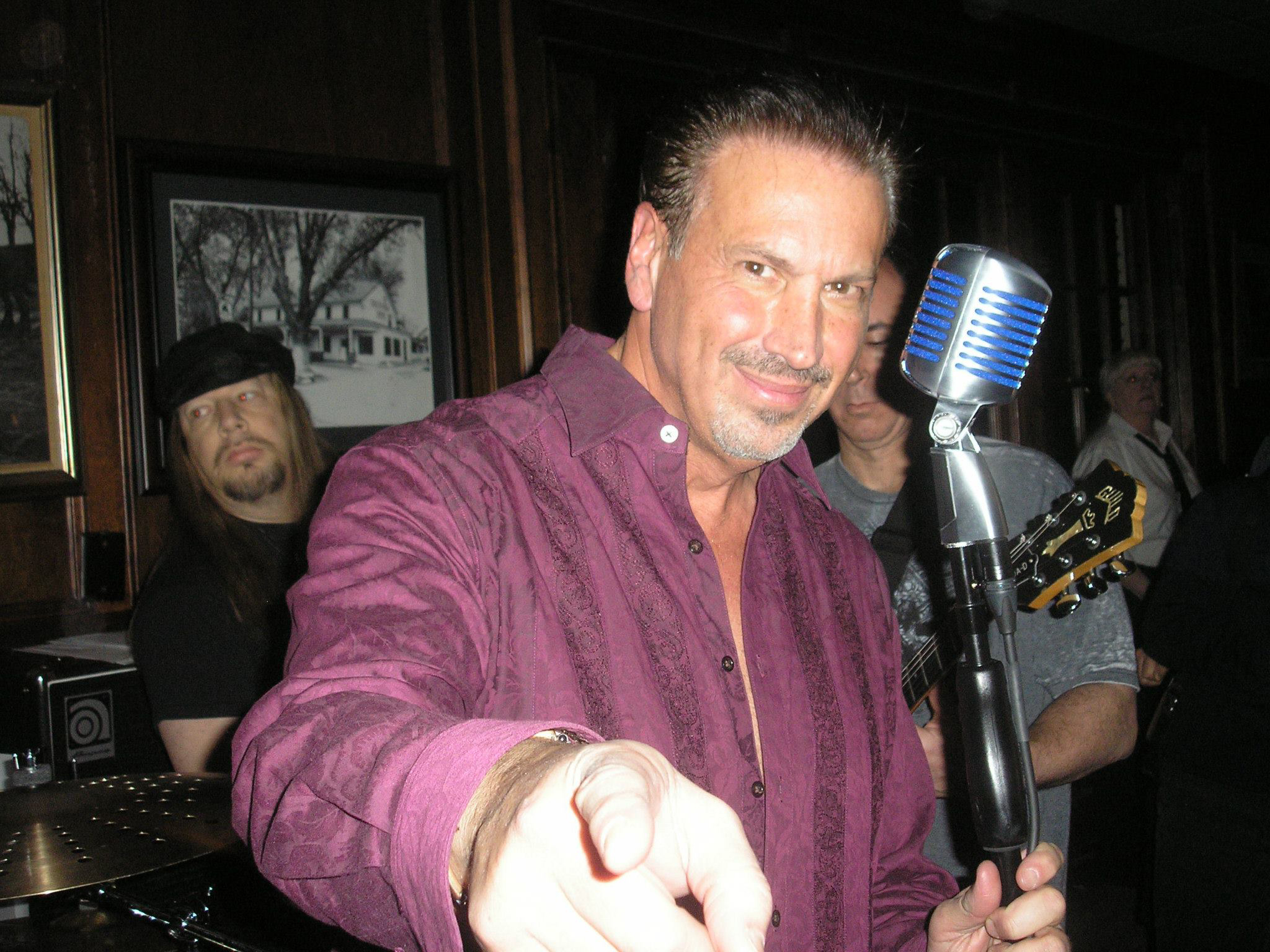 Barry gets behind the mic with the Rock of Ages band