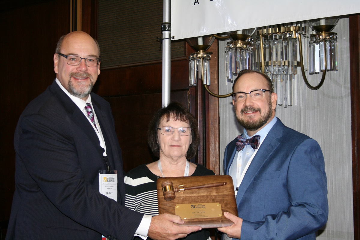The gavel of NCRA leadership is passed as Executive Director Terry Clemans and Immediate Past President Mary Campbell welcome new NCRA President Bill Bower