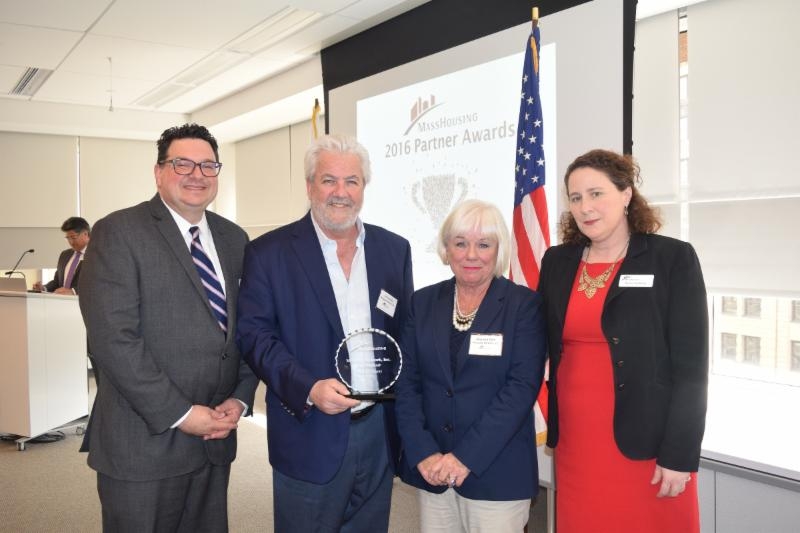 Timothy C. Sullivan, executive director of MassHousing; James Comosa, president of Mortgage Network; Maureen Elliott, NE regional manager for Mortgage Network; and Karen E. Kelleher, deputy director for MassHousing