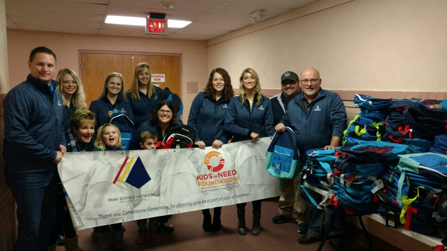 Members from Primary Residential Mortgage Inc. (PRMI) recently distributed 2,900 backpacks to six elementary schools across the nation in partnership with the Kids In Need Foundation (KINF)