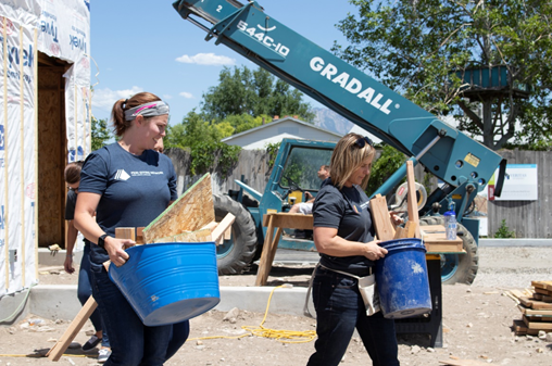 PRMI Giving Network volunteers recently lent their hands at the Salt Lake Valley Habitat for Humanity, helping construct two homes for the “Field of Dreams-Eco Community” project in Kearns, Utah