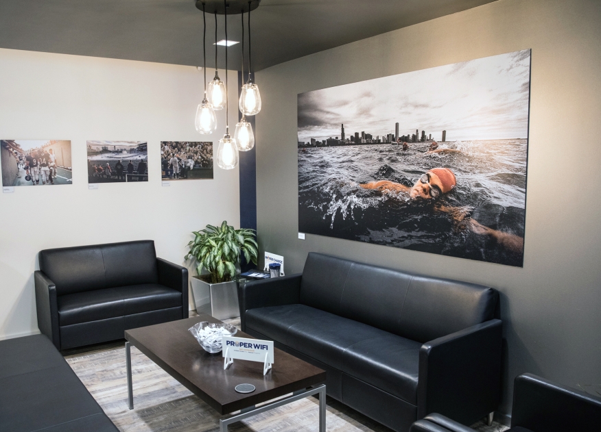 Proper Title recently celebrated the expansion of its Chicago Loop office and the opening of its new St. Charles, Ill. location. The lobby in the new Loop office features large photos of professional sporting events from Chicago photographer Charles Chern