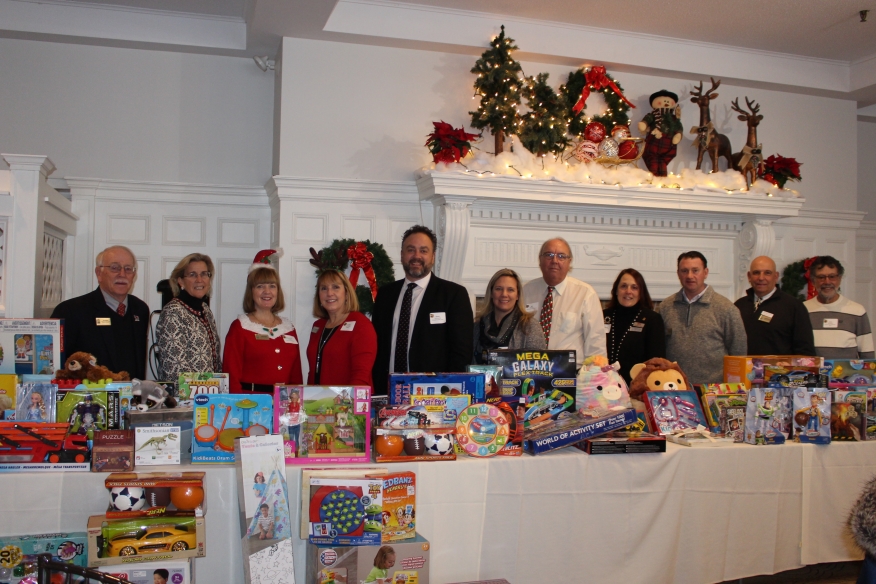 Professionals working in the mortgage industry plowed through snow to participate in the recent Rhode Island Mortgage Bankers Association (RIMBA) Annual Toys for Tots Breakfast at the Metacomet Golf Club
