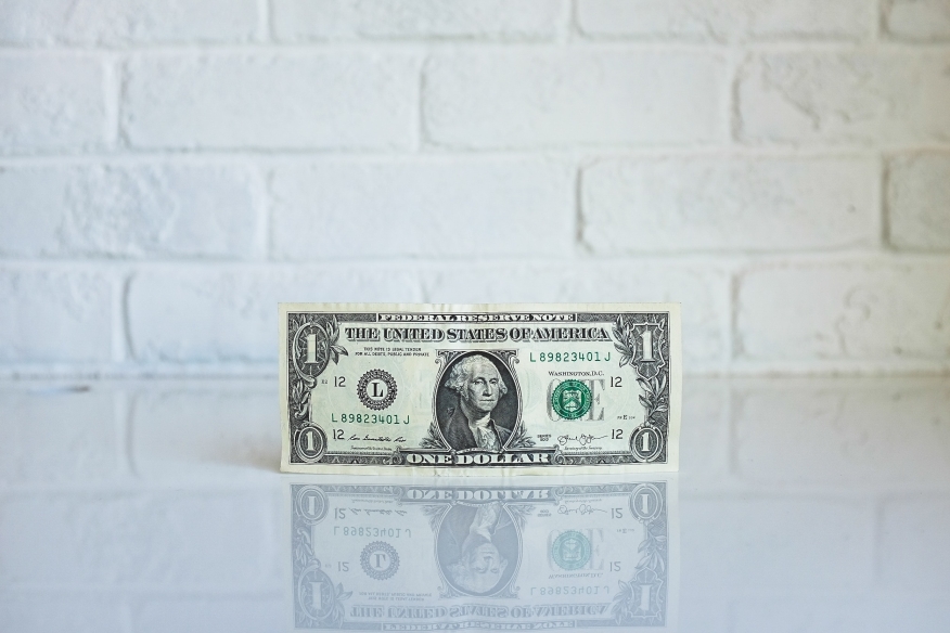 Dollar bill | Photo by NeONBRAND on Unsplash