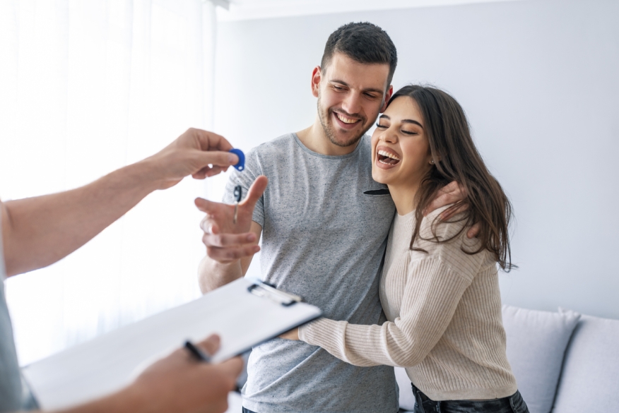 Couple purchasing a home. Credit: iStock.com/Dragana991