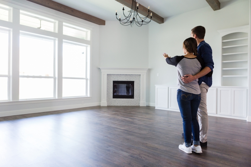 Couple in a new home. Credit: iStock.com/SDI Productions