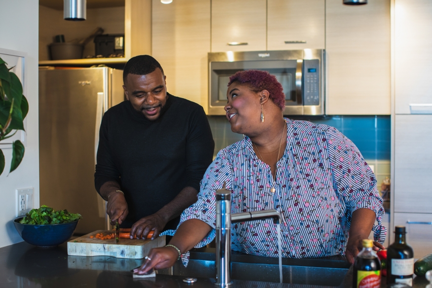 Black couple in kitchen