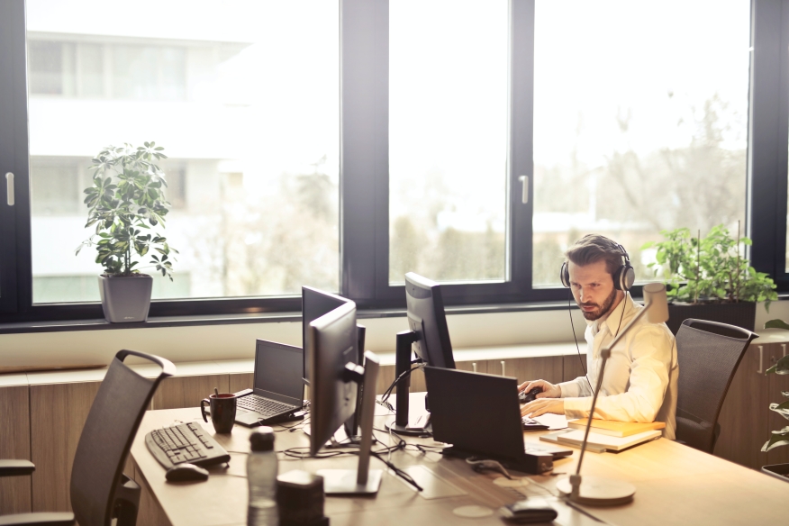 Man monitoring things in a call center.