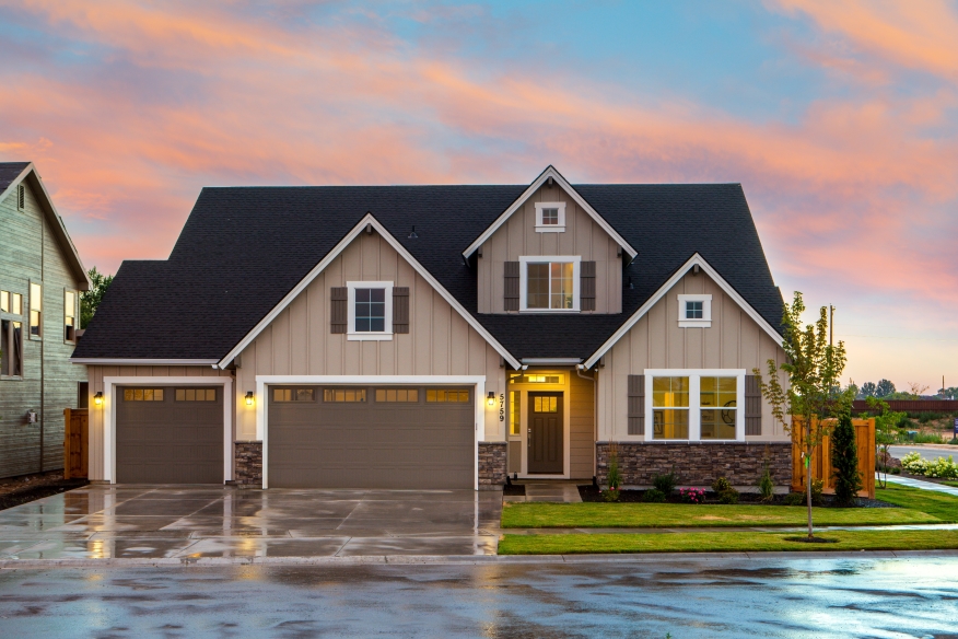 House with wet driveway.