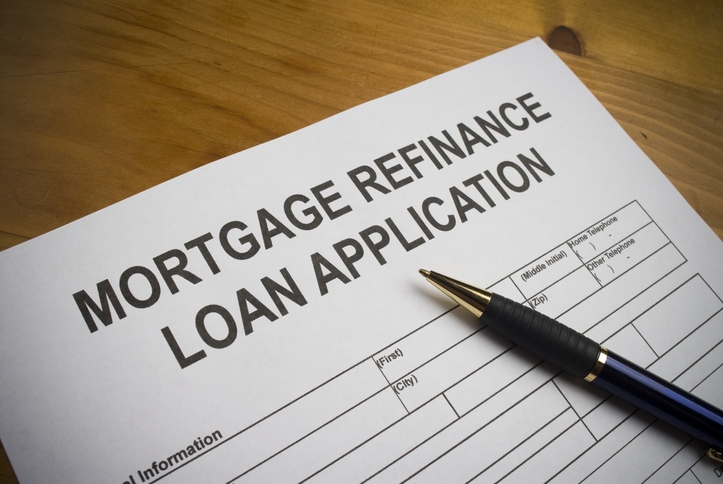 Photo of a mortgage refinance application. Credit: iStock.com/KLH49