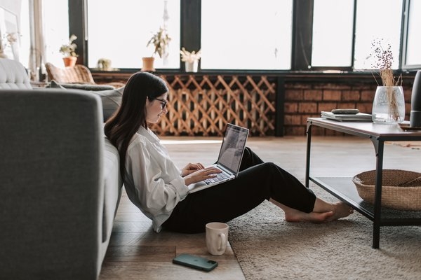 Woman using her laptop at home.