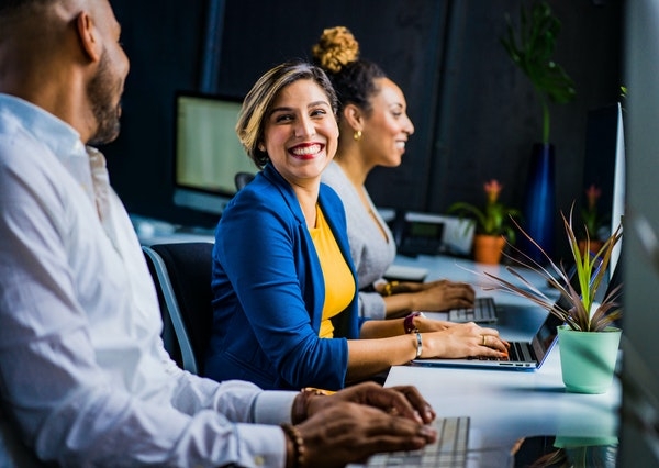 Stock photo of a positive workplace environment.