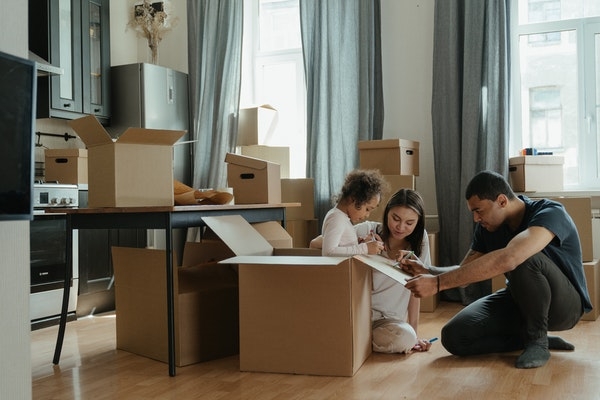 Family packing up to move.