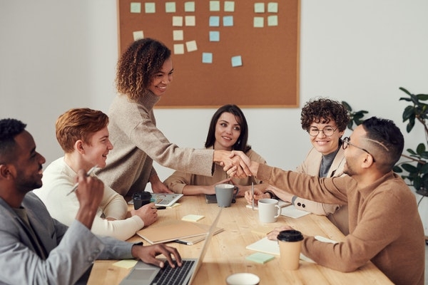 Photo of a diverse team working together.