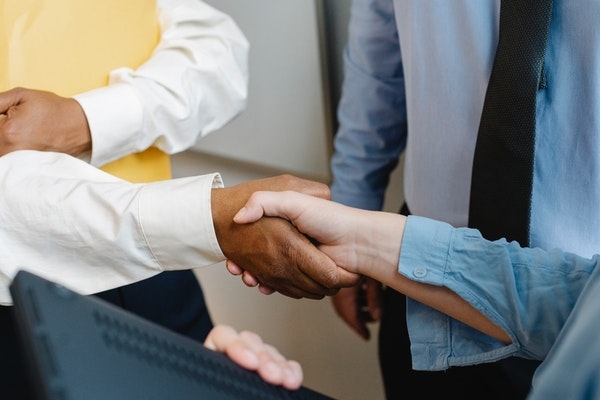 Handshake of a new hire.