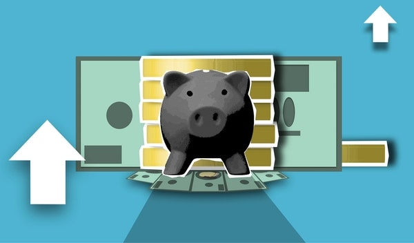 Digital photo of a piggy bank and arrows signaling and increase.