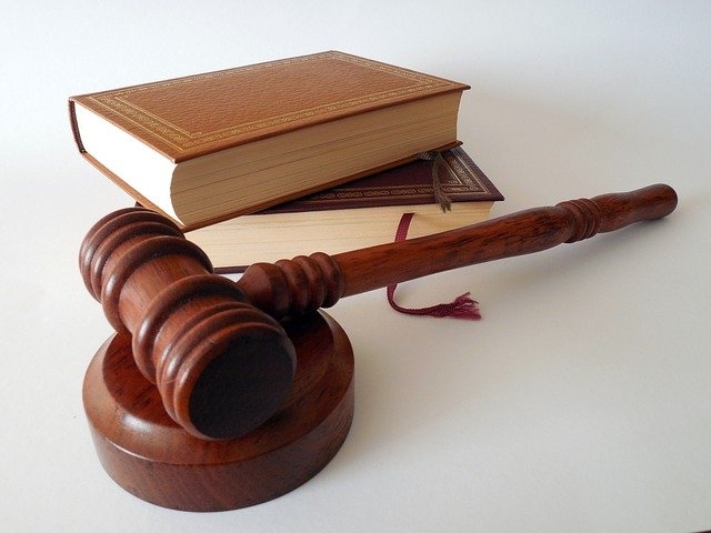 Photo of a gavel and legislative books.