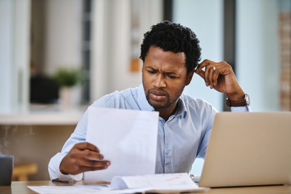 Photo of a man looking confused. Credit: iStockphoto.com/katleho Seisa.