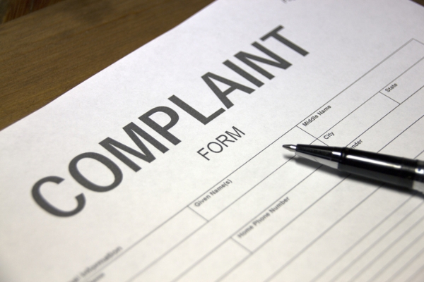 Photo of a complaint form. Credit: iStockphoto.com/Hailshadow.