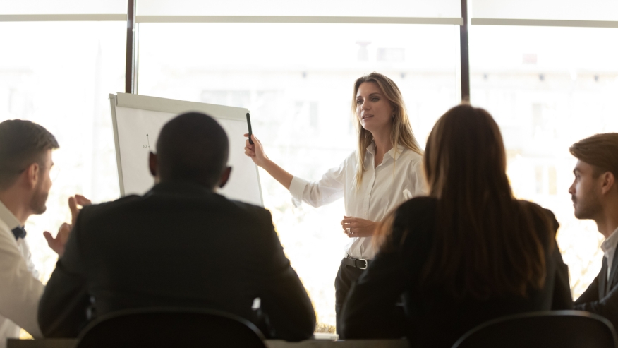 A mortgage professional explains the standards of her business to her staff.