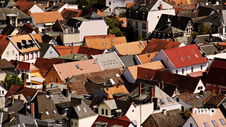 houses and rooftops in a densely populated neighborhood 