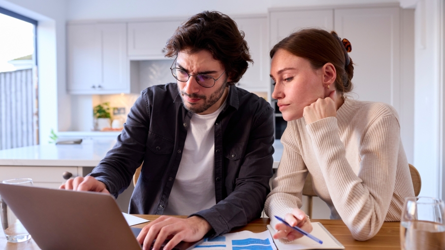 Potential Homebuyer Couple Unsure Of Purchase Decision