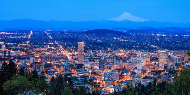 A view of Portland, OR at dusk, home of the Great Northwest Mortgage Expo - Portland.