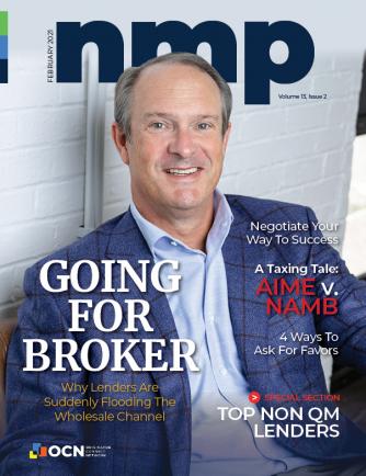 LoanSimple's Andrew Taylor smiling on the cover of NMP's February 2021 edition.