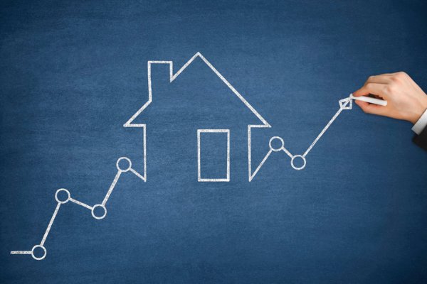 Photo of a drawing indicating rising home price and rates. Credit: iStockphoto.com/anilakkus.