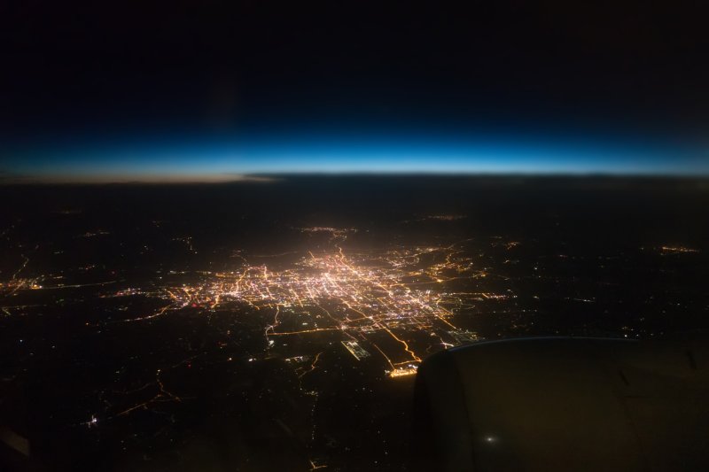 City lights viewed at night from an airplane. 